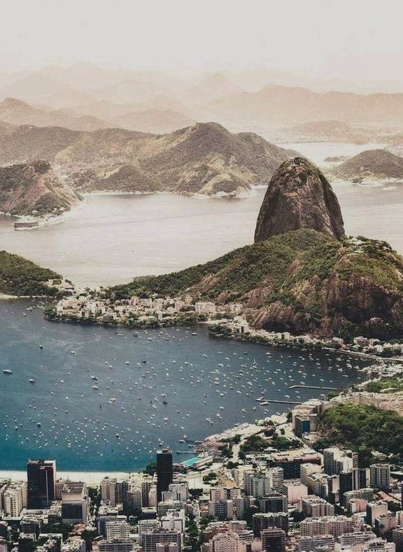 Sugarloaf Mountain above the moored boats of Botafogo Bay, Rio de Janeiro
